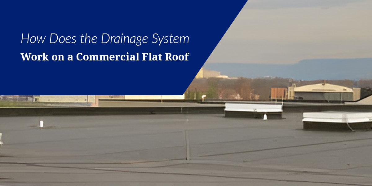How Does the Drainage System Work on a Commercial Flat Roof?